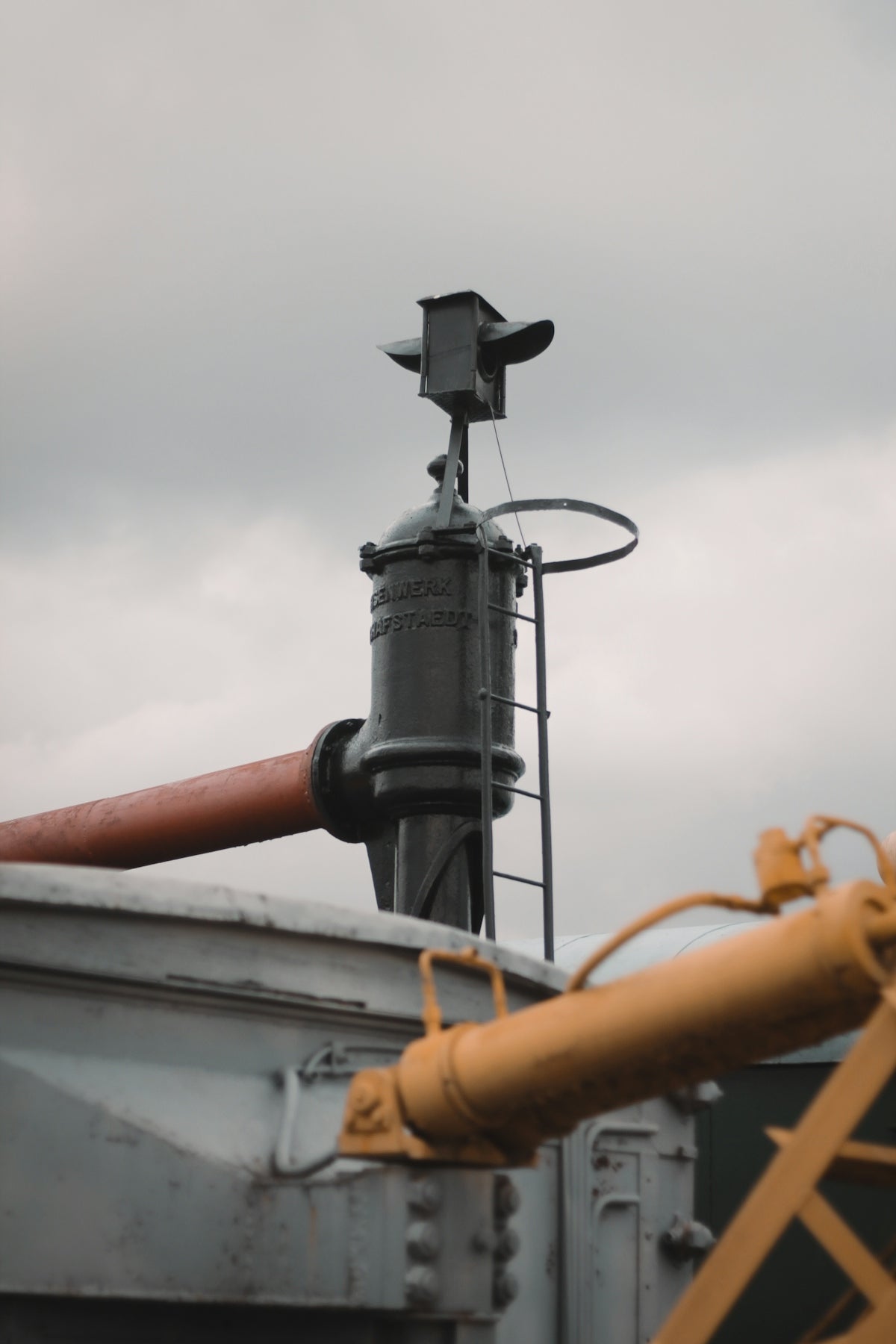a pipe on top of a metal structure
