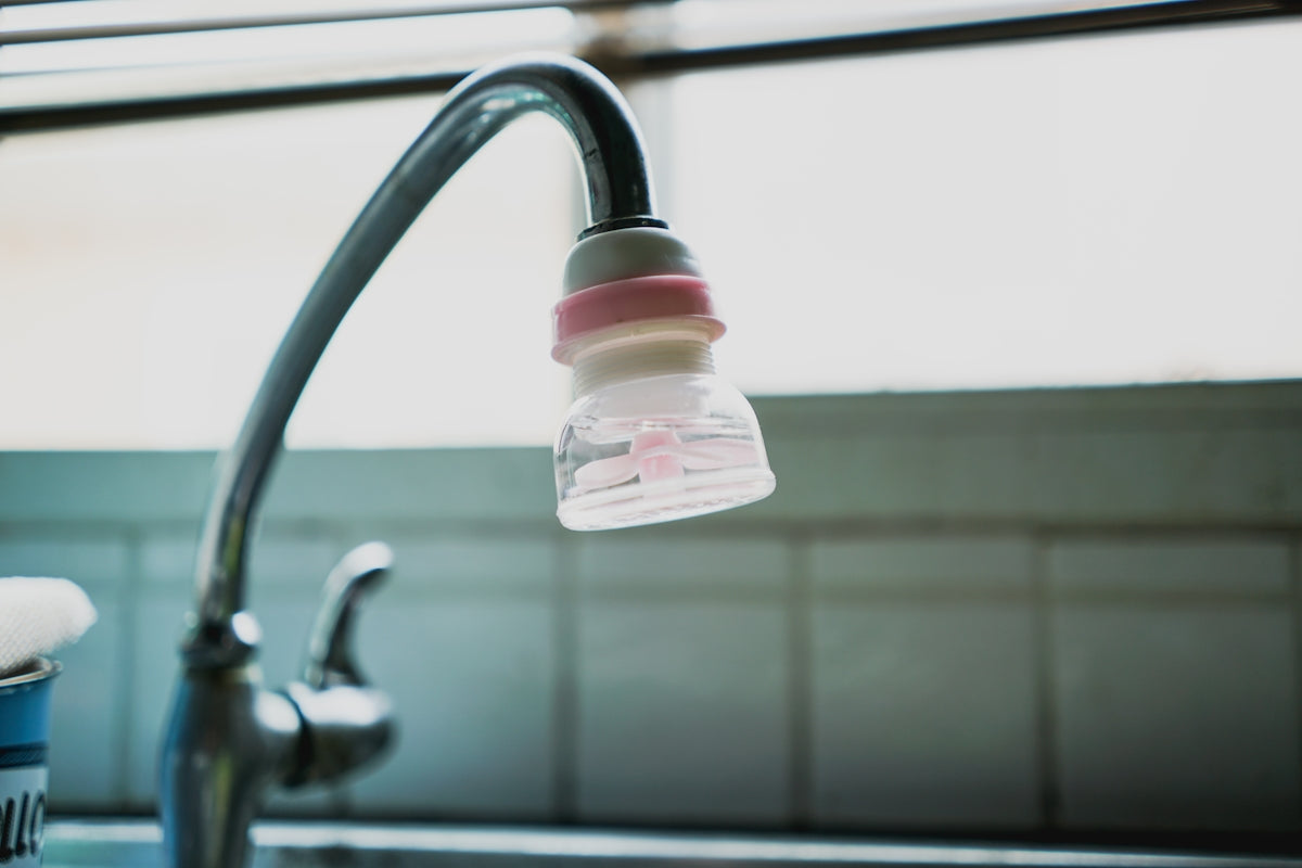 water filter attached on a faucet